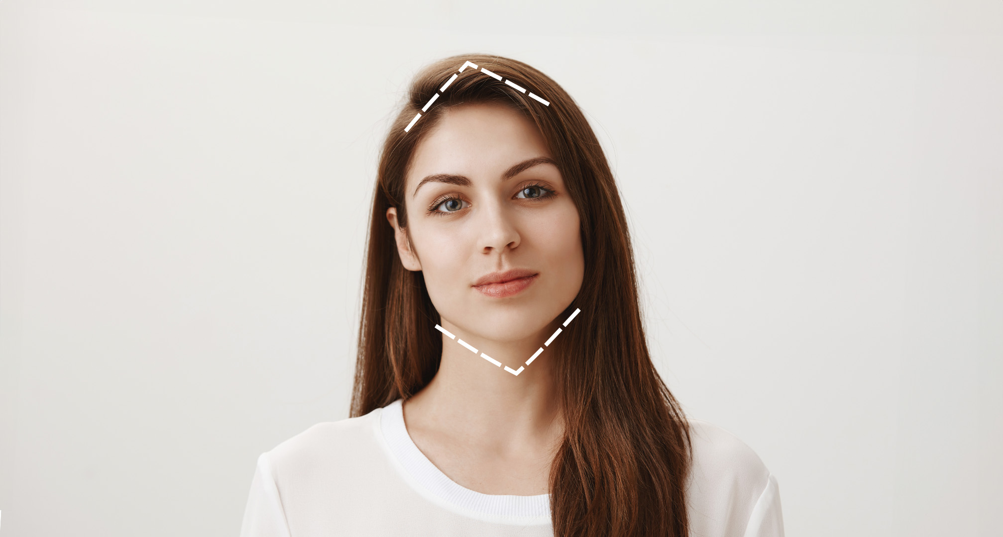 katkoviiva timantinmuotoisena kasvojen ympärillä kuvaamaan kasvojen muotoa